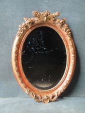 English oval gilt mirror A371